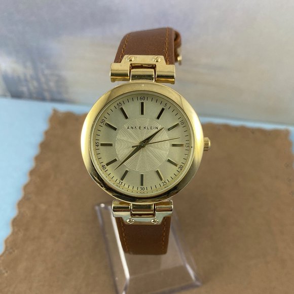 Anne Klein Unisex Gold Tone Watch Brown Strap